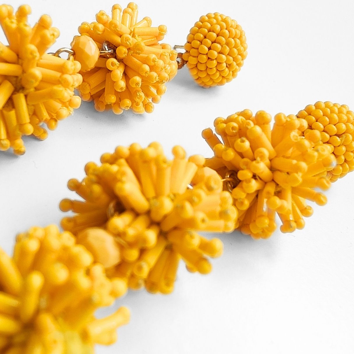 YELLOW POMPON EARRINGS