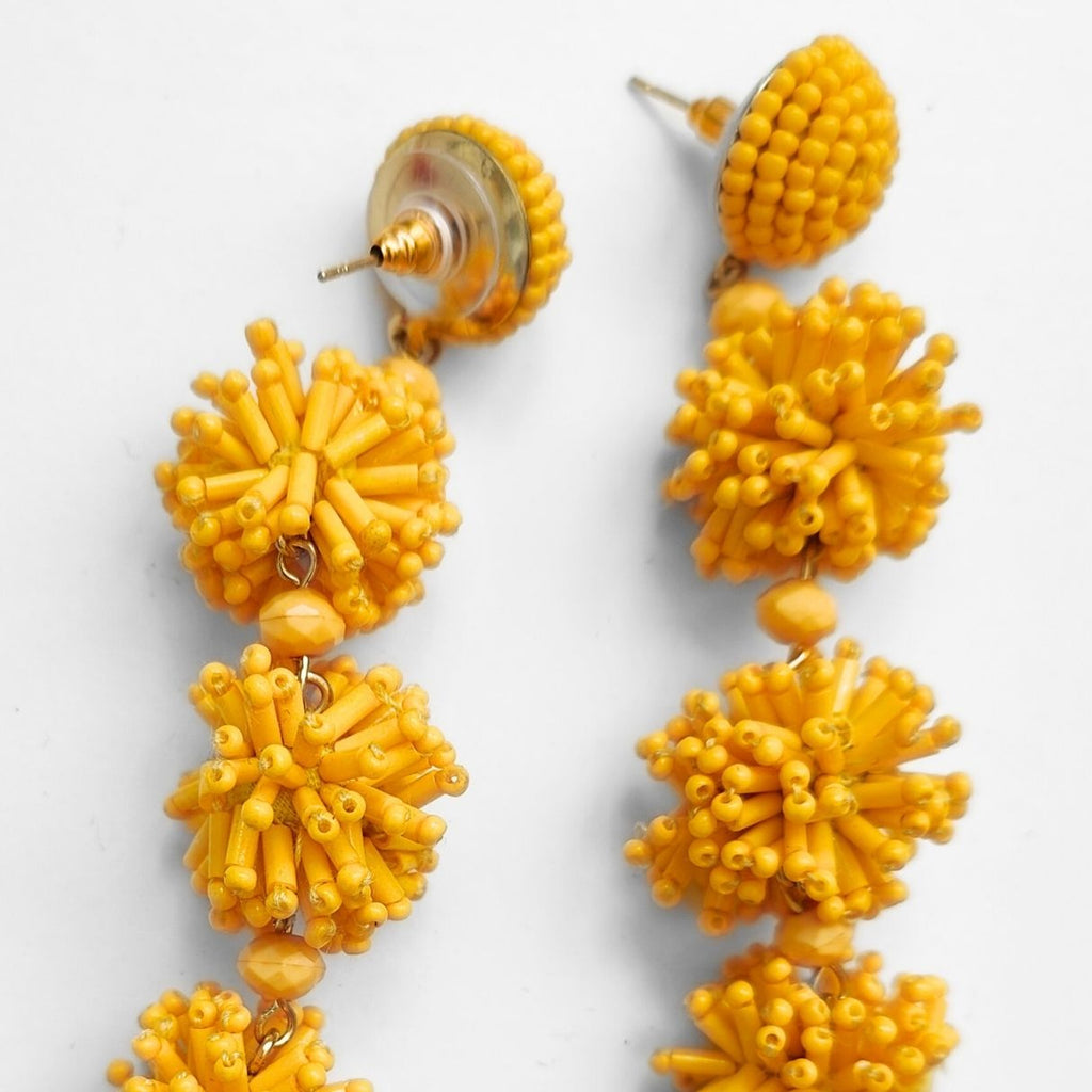 YELLOW POMPON EARRINGS