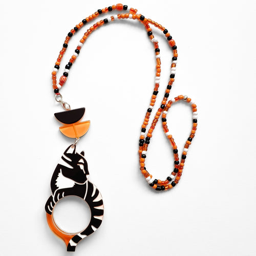 COLGANTE-GAFAS GATO WARHOL NARANJA - EDICIÓN 15 AÑOS